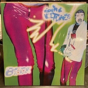 Very Rare Midnight Vultures by Beck. Unplayed on electric green vinyl